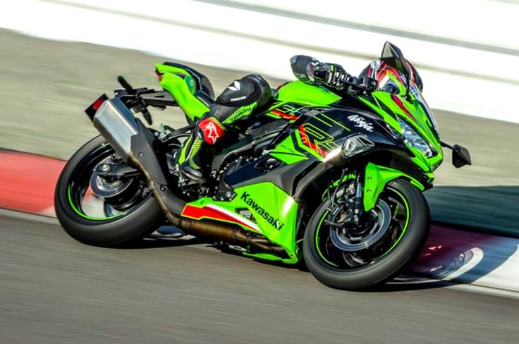 It competes with the Honda CBR650R (Rs 10.40 lakh), Triumph Daytona 660 (Rs 9.72 lakh) and Suzuki GSX8R (Rs 9.25 lakh) in India. Kawasaki Ninja ZX4RR front right side cornering image on track